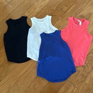 Set a four Lululemon tanks